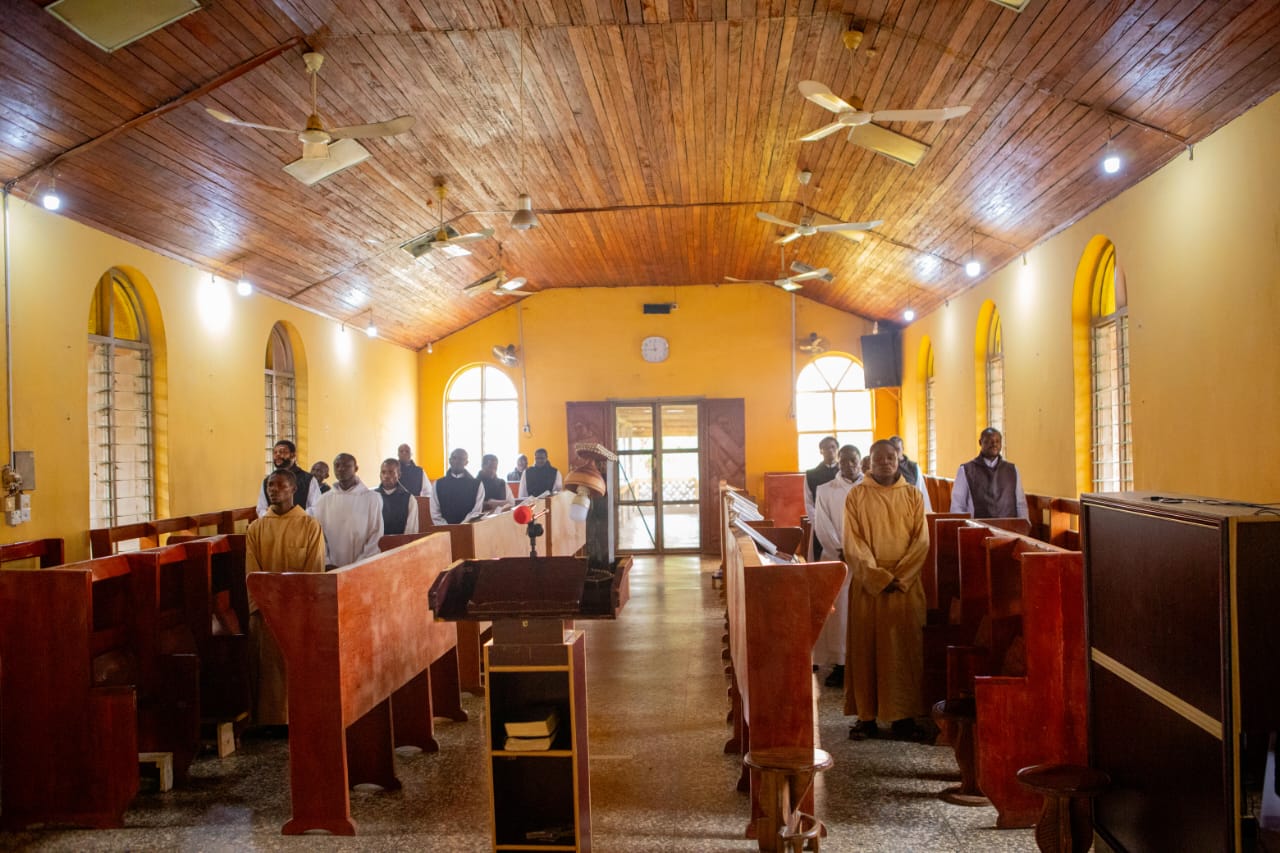 Monks about to begin their midday prayer