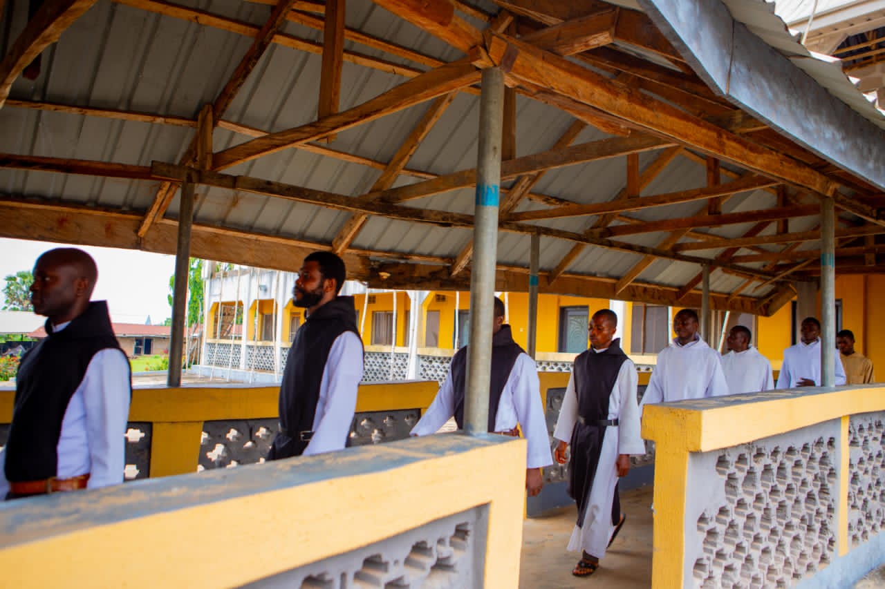 Monks processing to the refectory after prayer